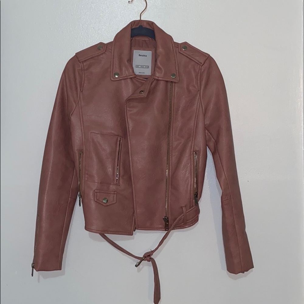 I am selling a Pink Bershka leather jacket.